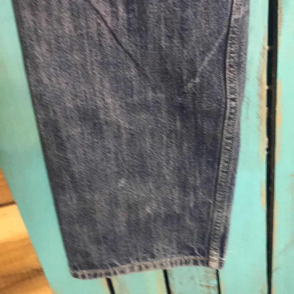 Levi’s 501 button fly Jeans size 35x28 (tag size 36x34) lightly distressed